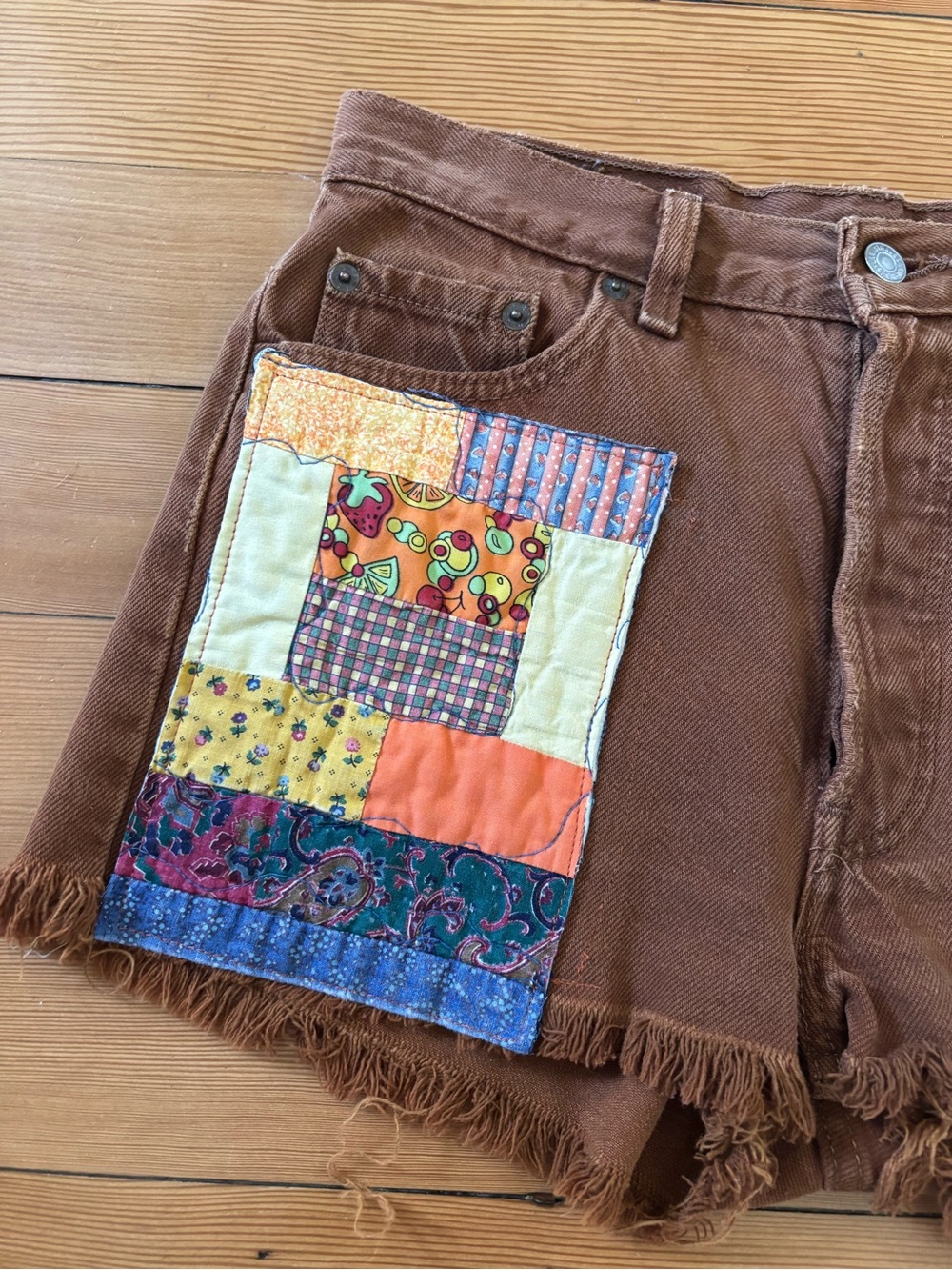 Vintage Levi’s 501 cut offs rust brown with quilted patches on front 90s USA